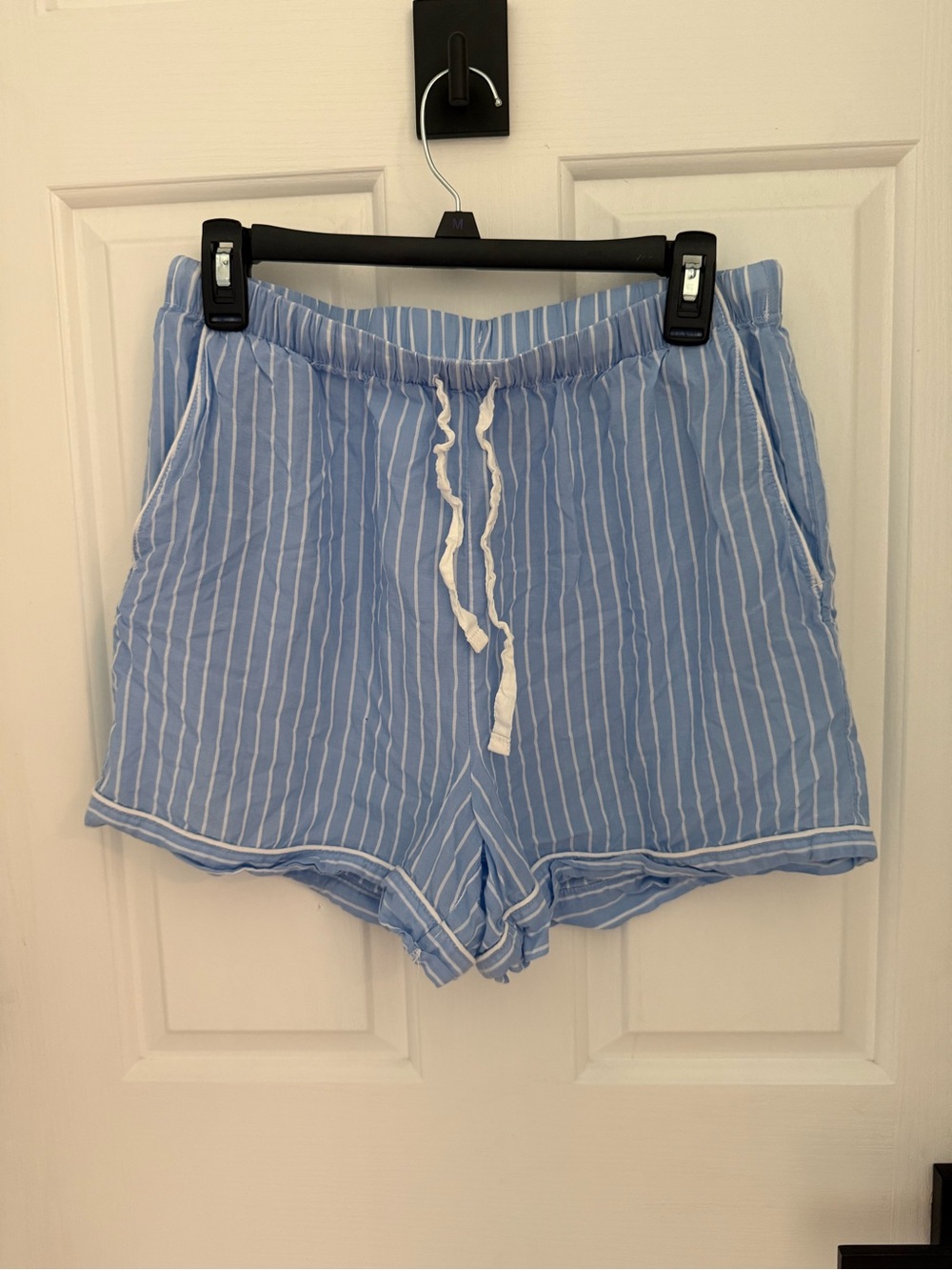 stars above Light Blue and White Striped Drawstring Shorts
